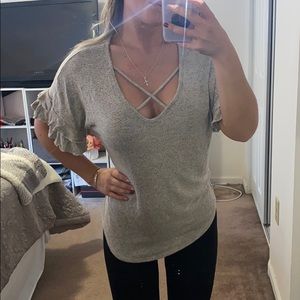 Cute crisscross and ruffle sweater tee